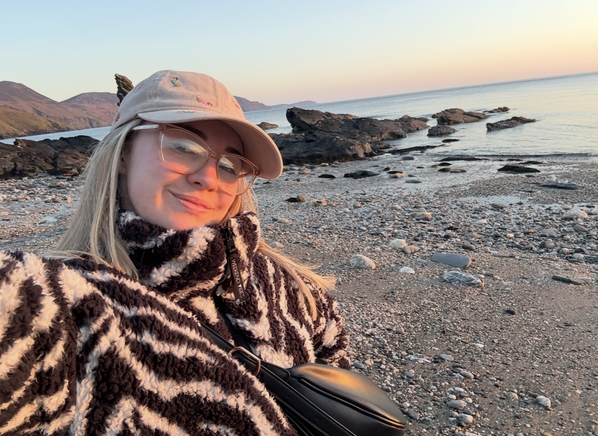 Emily at the beach at golden hour